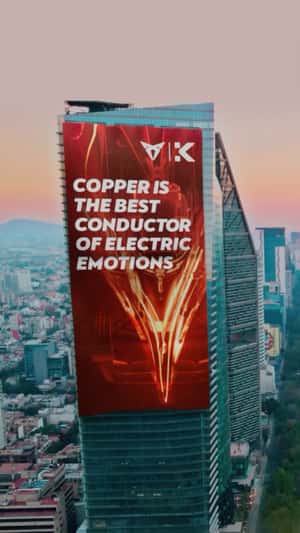Banner Unfurls on Tower in a fake-out-of-home ad of CUPRA