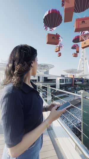 Boxes Carried by Parachutes in a fake-out-of-home ad of Mall of the Emirates