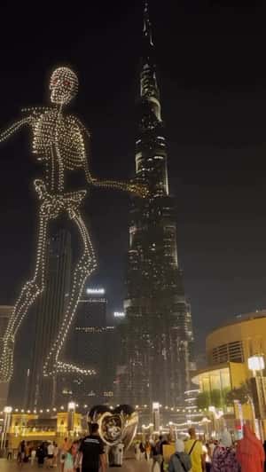 Skeleton Drone Show at Burj Khalifa in a fake-out-of-home ad of Dubai