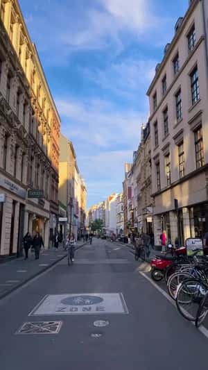 Sneakers Twist and Turn Above the Street in a fake-out-of-home ad of JD Sports