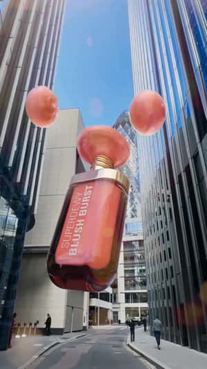 Blush Splatters on Building in a fake-out-of-home ad of Make Up Revolution