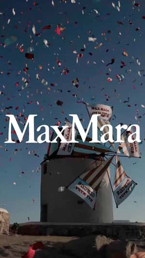 Confetti Bursts Out of Windmills in a fake-out-of-home ad of Max Mara