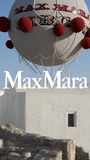 Gas Balloons Land at Church in a fake-out-of-home ad of Max Mara