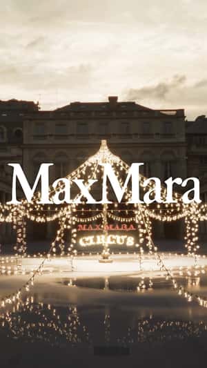 Bulb Circus Tent Lights Up Square in a fake-out-of-home ad of Max Mara