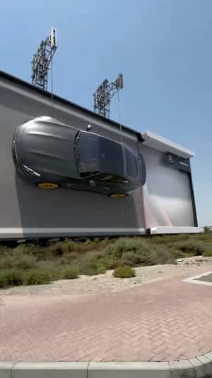 Sports Car Cruising on Billboard in a fake-out-of-home ad of Mercedes-Benz