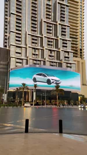 SUV Emerges from Digital Screen Ad in a fake-out-of-home ad of Mercedes Benz