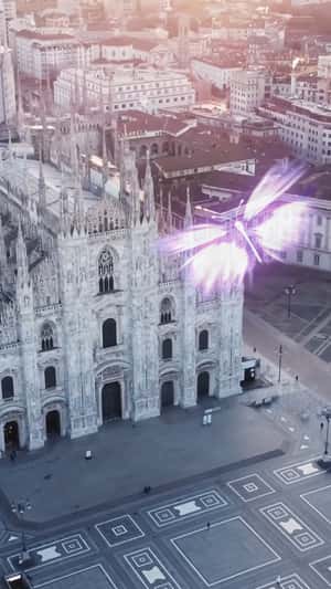Glowing Butterfly Emerges from Smartphone in a fake-out-of-home ad of OPPO