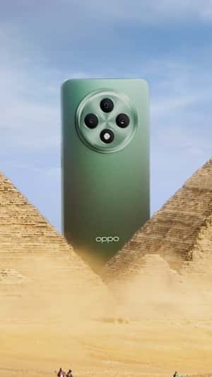 Smartphone Rises between Pyramids in a fake-out-of-home ad of OPPO