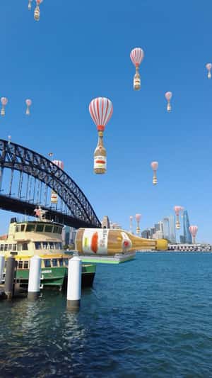 Wines on Parachute Float Above Bridge in a fake-out-of-home-ad of Pasqua