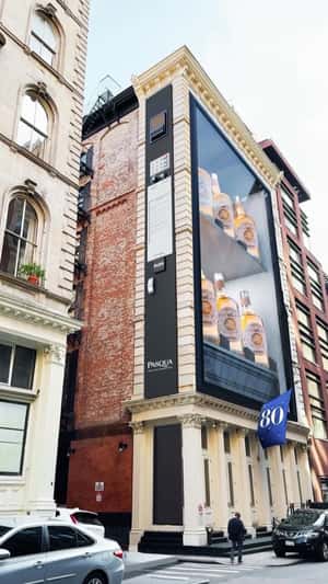 Wine Vending Machine on Building Facade in a fake-out-of-home-ad of Pasqua