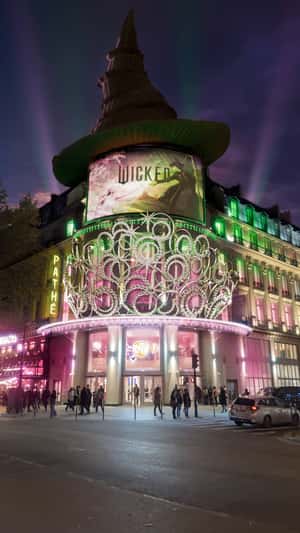 Witch Hat Perched on Palace Dome in a fake-out-of-home-ad of Pathé France