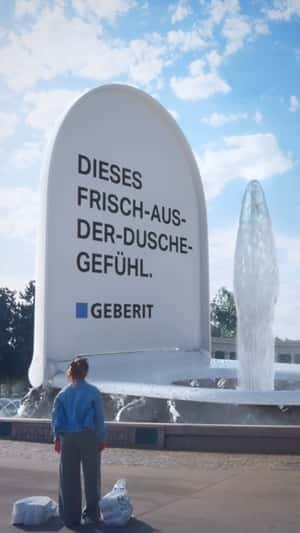 Toilet Bowl Installation on Fountain in a fake-out-of-home ad of Geberit