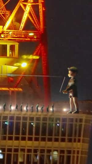 Playing Jumping Rope at Eiffel Tower in a fake-out-of-home ad of Netflix