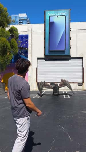 Dragon Emerges from Phone Screen in a fake-out-of-home ad of Samsung Galaxy