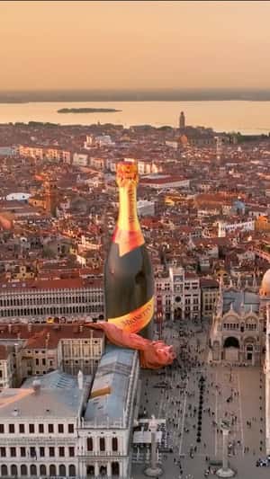 Bell Tower Transformed into Wine Bottle in a fake-out-of-home ad of Mionetto