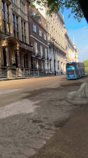 Smurf Double-decker Bus Heads to Big Ben in a fake-out-of-home ad of Paramount Pictures
