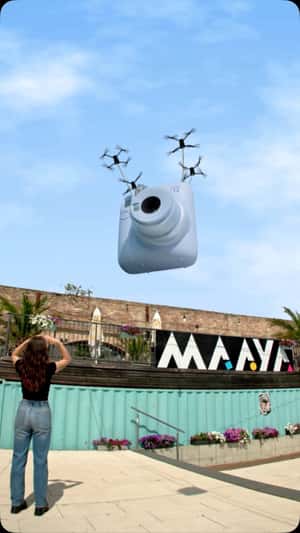 Camera Delivery by Drones in a fake-out-of-home ad of Instax