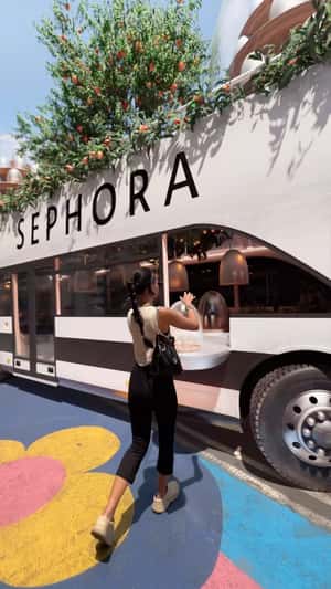 Woman Takes Beauty Collection from Bus in a fake-out-of-home ad of OLEHENRIKSEN
