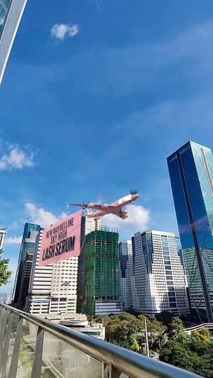 Pink Plane with Banner in fake-out-of-home ad of Maybelline