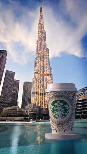 Coffee Cup with Mandala Tattoo in a fake-out-of-home ad of Starbucks