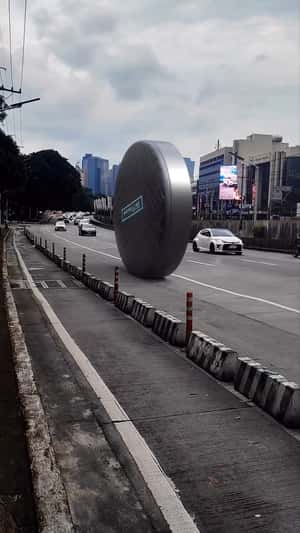 Compact Powder Rolling in fake-out-of-home ad of Maybelline