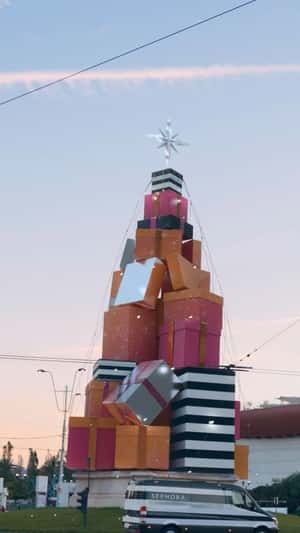 Christmas Tree Gift Boxes on the Street in a fake-out-of-home ad of Sephora