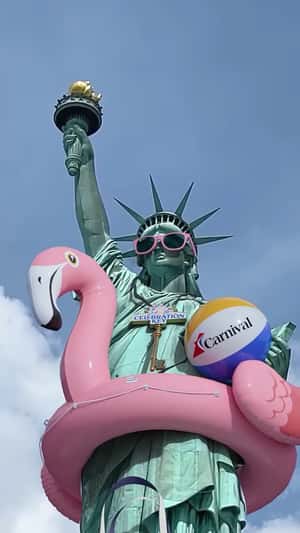 Statue of Liberty Ready for Beach in a fake-out-of-home ad of Carnival Cruise Lines