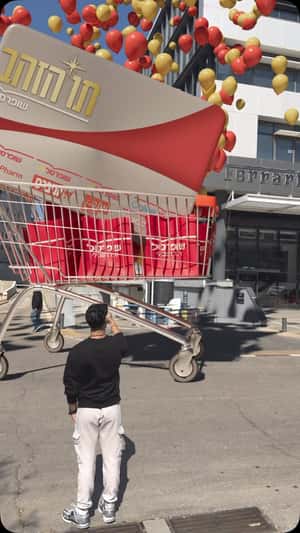Push Carts  Rolling Down with Voucher in a fake-out-of-home ad of Shufersal