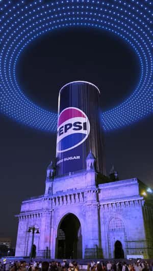 Can Inflates at Gateway to India in a fake-out-of-home ad of Pepsi