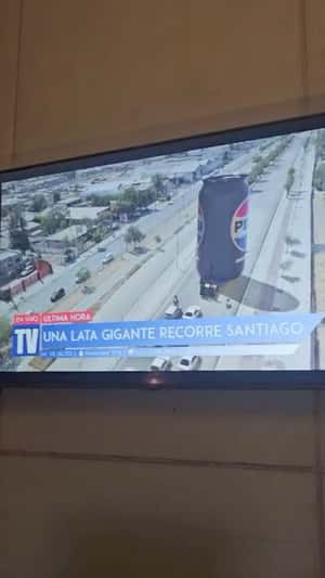 Giant Soda Can in News Headline in a fake-out-of-home ad of Pepsi