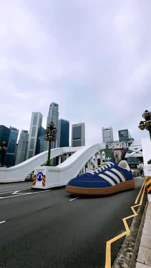 Sneakers Flying in Singapore in a fake-out-of-home ad of Adidas