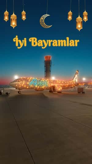 Plane Covered with Glowing Crescent Moons in a fake-out-of-home ad of AJet