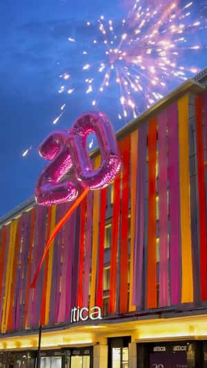 Number Balloons Rise from Mall Facade in a fake-out-of-home ad of Attica