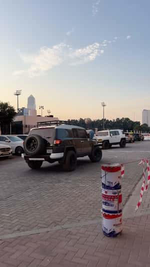 SUVs Playing Volleyball in a fake-out-of-home ad of automax