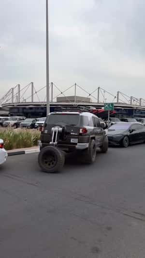 Land Cruiser Parked with Spare Tire in a fake-out-of-home ad of Automax