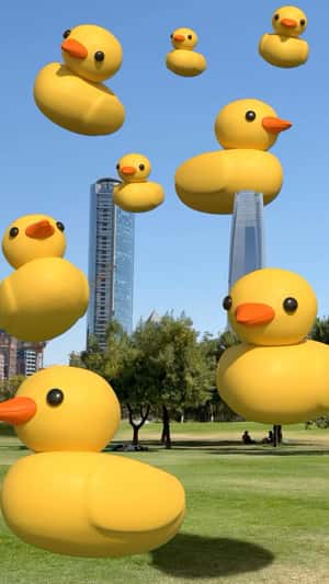 Rubber Ducks Float in the City in a fake-out-of-home ad of Bath & Body Works