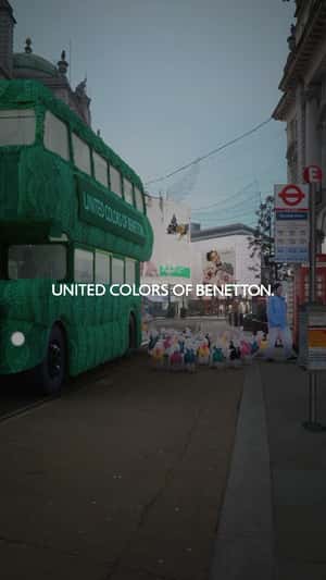 Dogs Exit from Double-decker Bus in a fake-out-of-home ad of Benetton