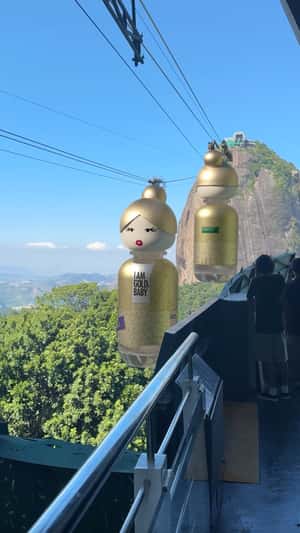 Perfume Bottles Cable Car in a fake-out-of-home ad of Benetton Perfume