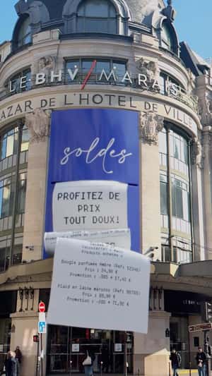 Receipt Rolls Out on Facade in a fake-out-of-home ad of Le BHV Marais