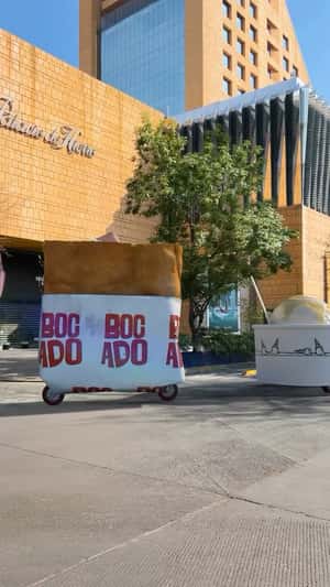 Food Carts Roll Down the Street in a fake-out-of-home ad of Bocado