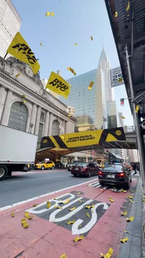 Yellow Confetti Rains in New York in a fake-out-of-home ad of Borussia Dortmund