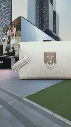 Golf Ball from Digital Screen Shoots on Bag in a fake-out-of-home ad of GQ
