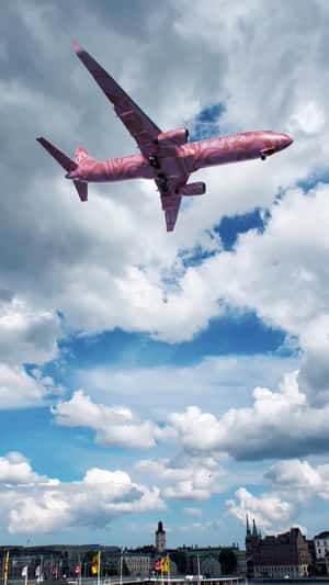 Plane Flies Above Stockholm City Hall in a fake-out-of-home ad of Burga