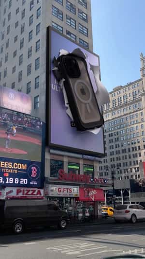 Phone Falls from Billboard in a fake-out-of-home ad of CASETiFY