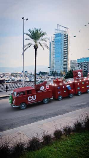 Bills Float in Air from Truck in a fake-out-of-home ad of CashUnited