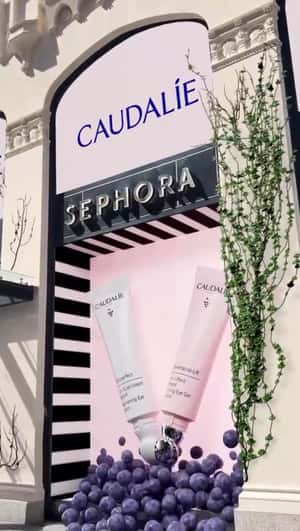 Grapes Spill Out of Window Display in a fake-out-of-home ad of Caudalie