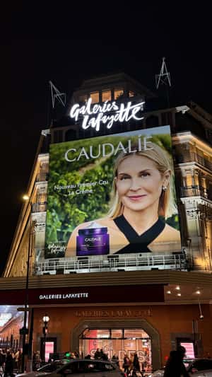 Shopping Center Glows in Purple in a fake-out-of-home ad of Caudalie