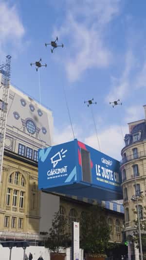 Drones Carry Boxship Billboard in a fake-out-of-home ad of CDiscount