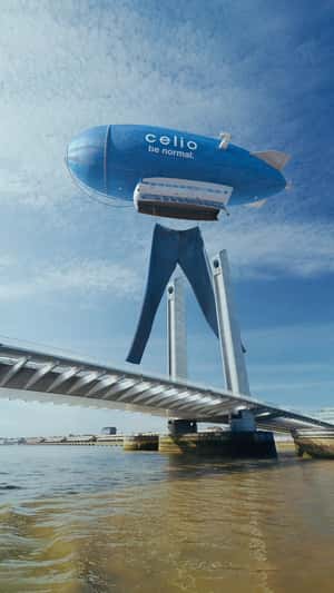 Jeans Hang from Airship in a fake-out-of-home ad of Celio