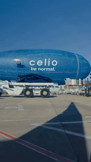 Jeans Loaded onto Airship in a fake-out-of-home ad of Celio